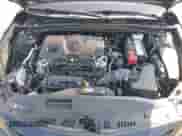 2023 Toyota Camry SE with VIN 4T1G11BKXPU097643, listed as a IAAI auction lot 42833306 with 23,580 mi miles and . Bid and sale history available at DreamBid. Image 10.