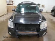 ✅ 2011 Mercury Mariner • VIN: 4M2CN9BG9BKJ06722 • Lot: 62014585. Listed on Copart with 242,214 mi. Free auction sales archive from the USA and detailed vehicle history report at DreamBid. Image 5.