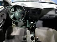 ✅ 2010 Kia Rio LX • VIN: KNADH5A3XA6700278 • Lot: 84023494. Listed on Copart with Not provided. Free auction sales archive from the USA and detailed vehicle history report at DreamBid. Image 8.