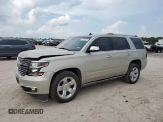 2015 Chevrolet Tahoe LTZ z VIN 1GNSCCKC2FR288964, wystawiony jako Copart lot #70378225 z przebiegiem 101 902 mil mil oraz Szkoda całkowita • Salvage title. Historia ofert i sprzedaży dostępna na DreamBid. Obrazek 1.