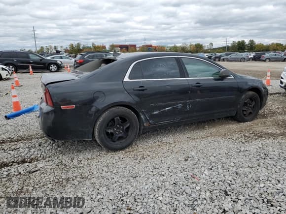 ✅ 2012 Chevrolet Malibu 1LS • VIN: 1G1ZB5E06CF220180 • Lot: 75759154. Listed on Copart with 146,827 mi. Free auction sales archive from the USA and detailed vehicle history report at DreamBid. Image 3.