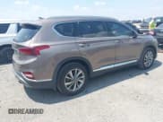 ✅ 2020 Hyundai Santa Fe SEL • VIN: 5NMS33AD3LH261307 • Lot: 42940601. Listed on IAAI with 95,444 mi. Free auction sales archive from the USA and detailed vehicle history report at DreamBid. Image 4.