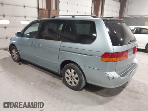 ✅ 2003 Honda Odyssey EX-L • VIN: 5FNRL18093B119633 • Lot: 43811736. Listed on IAAI with 231,605 mi. Free auction sales archive from the USA and detailed vehicle history report at DreamBid. Image 3.