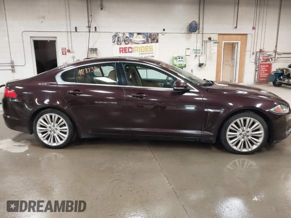 ✅ 2012 Jaguar XF Portfolio • VIN: SAJWA0HB1CLS34259 • Lot: 42873865. Listed on IAAI with 143,002 mi. Free auction sales archive from the USA and detailed vehicle history report at DreamBid. Image 13.