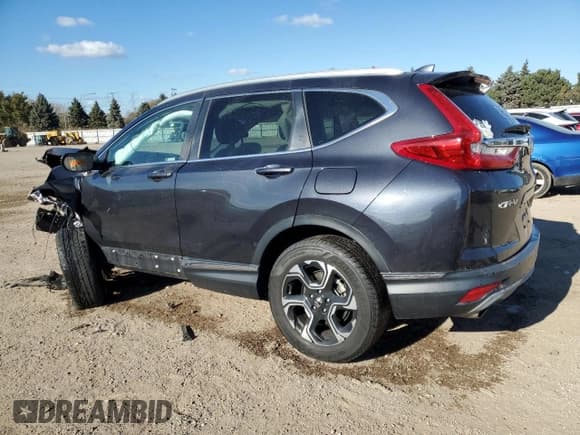 ✅ 2019 Honda CR-V Touring • VIN: 2HKRW2H99KH602146 • Lot: 90425595. Listed on Copart with Not provided. Free auction sales archive from the USA and detailed vehicle history report at DreamBid. Image 2.