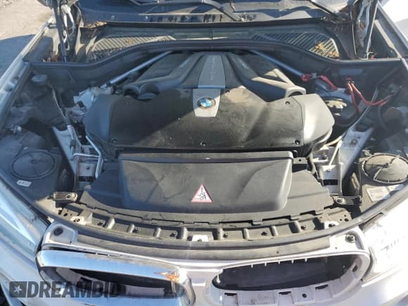 ✅ 2014 BMW X5 xDrive50i • VIN: 5UXKR6C57E0C03114 • Лот: 57940175. Опубликован ранее на Copart с пробегом 165 249 миль. Бесплатный доступ к архиву аукционных продаж из США и подробный отчёт об истории автомобиля на DreamBid. Изображение 12.