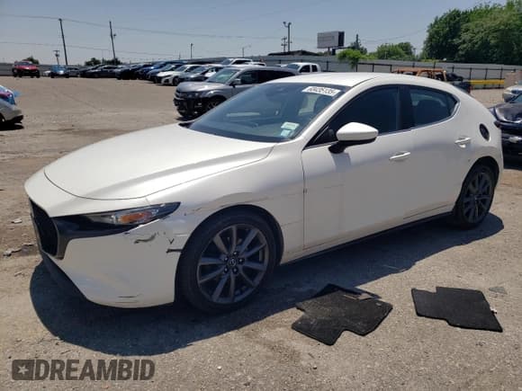 ✅ 2021 Mazda 3 Select • VIN: JM1BPBKL1M1314621 • Lot: 60435135. Listed on Copart with 102,406 mi. Free auction sales archive from the USA and detailed vehicle history report at DreamBid. Image 1.