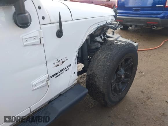 ✅ 2017 Jeep Wrangler Unlimited Sahara • VIN: 1C4HJWEG2HL727594 • Лот: 43718510. Опубликован ранее на IAAI с пробегом 105 294 миль. Бесплатный доступ к архиву аукционных продаж из США и подробный отчёт об истории автомобиля на DreamBid. Изображение 19.