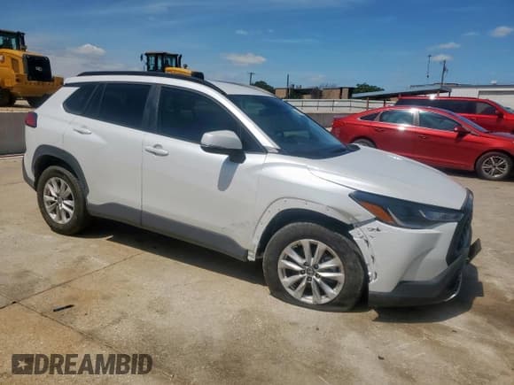 ✅ 2023 Toyota Corolla Cross LE • VIN: 7MUCAAAG4PV070612 • Lot: 58989675. Listed on Copart with 11,807 mi. Free auction sales archive from the USA and detailed vehicle history report at DreamBid. Image 4.
