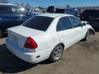 ✅ 2001 Mitsubishi Mirage • VIN: JA3AY36C31U016573 • Лот: 43301359. Опубликован ранее на IAAI с пробегом 233 277 миль. Бесплатный доступ к архиву аукционных продаж из США и подробный отчёт об истории автомобиля на DreamBid. Изображение 4.