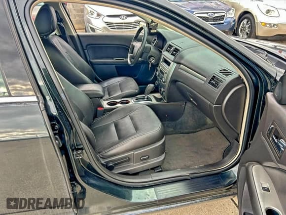 ✅ 2010 Ford Fusion Hybrid • VIN: 3FADP0L36AR423269 • Lot: 95870955. Wystawiony na Copart z przebiegiem 48 855 mil. Bezpłatny archiwum sprzedaży aukcyjnych z USA i szczegółowy raport historii pojazdu na DreamBid. Zdjęcie 5.