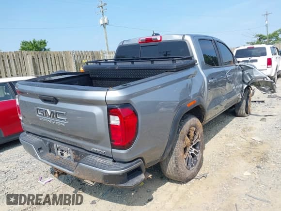 ✅ 2023 GMC Canyon 4WD AT4 • VIN: 1GTP6DEK6P1143991 • Lot: 42865413. Listed on IAAI with 49,712 mi. Free auction sales archive from the USA and detailed vehicle history report at DreamBid. Image 4.