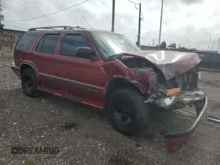 1999 Chevrolet Blazer LS z VIN 1GNCS13W2X2156012, wystawiony jako Copart lot #79730344 z przebiegiem 142 788 mil mil oraz Szkoda całkowita • Salvage title. Historia ofert i sprzedaży dostępna na DreamBid. Obrazek 4.