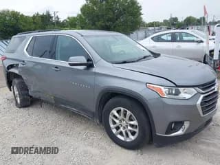 ✅ 2021 Chevrolet Traverse LT Cloth • VIN: 1GNERGKWXMJ101835 • Lot: 43141562. Wystawiony na IAAI z przebiegiem 94 711 mil. Bezpłatny archiwum sprzedaży aukcyjnych z USA i szczegółowy raport historii pojazdu na DreamBid. Zdjęcie 1.