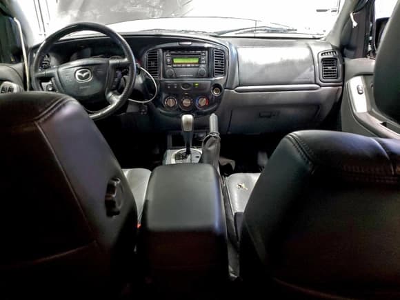 ✅ 2006 Mazda Tribute S • VIN: 4F2CZ96136KM29153 • Lot: 94643295. Listed on Copart with 41,381 mi. Free auction sales archive from the USA and detailed vehicle history report at DreamBid. Image 8.