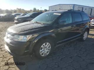 2013 Dodge Journey American Value with VIN 3C4PDCAB1DT722347, listed as a Copart auction lot 87449465 with 169,855 mi miles and Clean title. Bid and sale history available at DreamBid. Image 1.