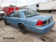 ✅ 2000 Ford Crown Victoria • VIN: 2FAFP72W4YX181431 • Лот: 41514424. Опубликован ранее на IAAI с пробегом 265 834 миль. Бесплатный доступ к архиву аукционных продаж из США и подробный отчёт об истории автомобиля на DreamBid. Изображение 3.