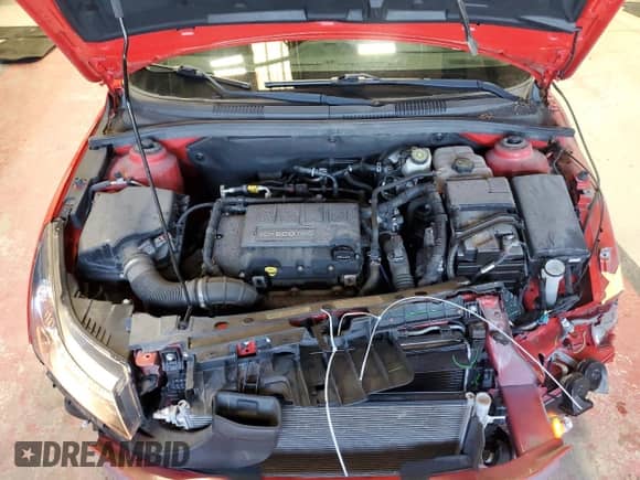 2014 Chevrolet Cruze 1LT z VIN 1G1PC5SB0E7301330, wystawiony jako Copart lot #89848315 z przebiegiem 33 098 mil mil oraz Szkoda całkowita • Salvage title. Historia ofert i sprzedaży dostępna na DreamBid. Obrazek 11.