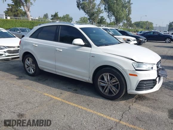 ✅ 2018 Audi Q3 Premium • VIN: WA1BCCFS8JR024449 • Lot: 42594435. Listed on IAAI with 83,729 mi. Free auction sales archive from the USA and detailed vehicle history report at DreamBid. Image 1.