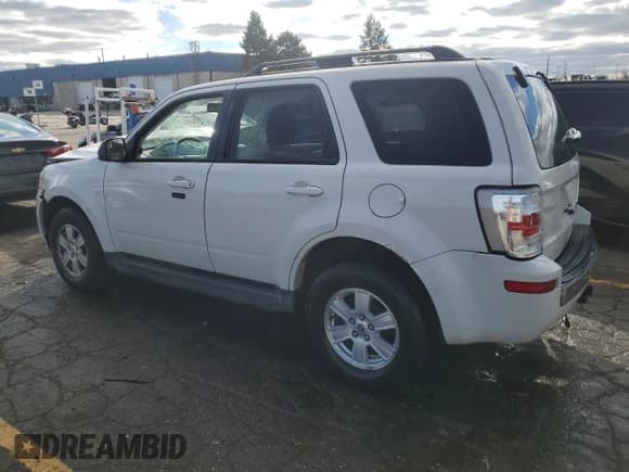 ✅ 2010 Mercury Mariner • VIN: 4M2CN9BG5AKJ07381 • Lot: 78217074. Listed on Copart with 96,362 mi. Free auction sales archive from the USA and detailed vehicle history report at DreamBid. Image 2.