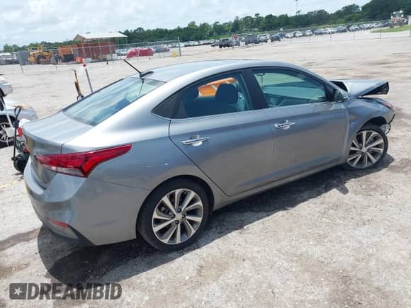 2022 Hyundai Accent Limited z VIN 3KPC34A6XNE165809, wystawiony jako IAAI lot #42734193 z przebiegiem 53 524 mil mil oraz . Historia ofert i sprzedaży dostępna na DreamBid. Obrazek 4.