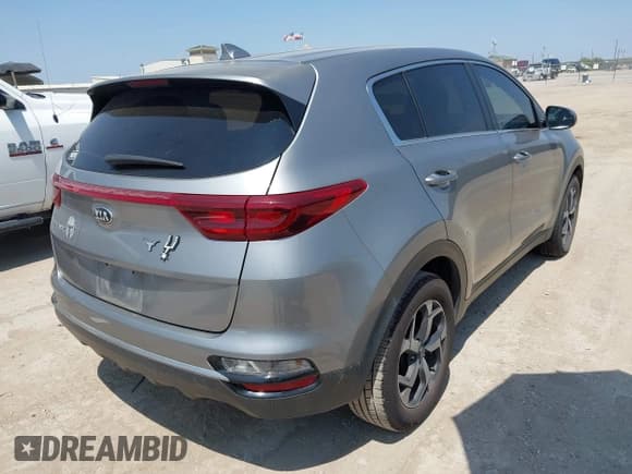 ✅ 2020 Kia Sportage LX • VIN: KNDPM3AC8L7797803 • Lot: 43187357. Listed on IAAI with 110,526 mi. Free auction sales archive from the USA and detailed vehicle history report at DreamBid. Image 4.