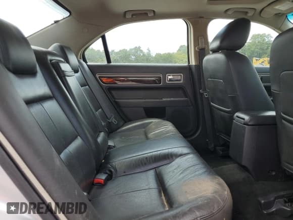 ✅ 2009 Lincoln MKZ • VIN: 3LNHM28T99R605435 • Lot: 84745495. Wystawiony na Copart z przebiegiem 194 510 mil. Bezpłatny archiwum sprzedaży aukcyjnych z USA i szczegółowy raport historii pojazdu na DreamBid. Zdjęcie 10.