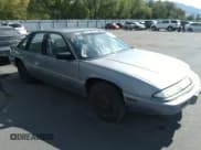 ✅ 1993 Pontiac Grand Prix LE • VIN: 1G2WH54T0PF242464 • Lot: 35153853. Listed on IAAI with 122,467 mi. Free auction sales archive from the USA and detailed vehicle history report at DreamBid. Image 1.