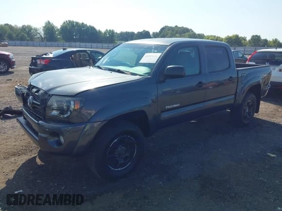 ✅ 2011 Toyota Tacoma PreRunner • VIN: 3TMJU4GN0BM110452 • Lot: 43183116. Listed on IAAI with 233,826 mi. Free auction sales archive from the USA and detailed vehicle history report at DreamBid. Image 2.