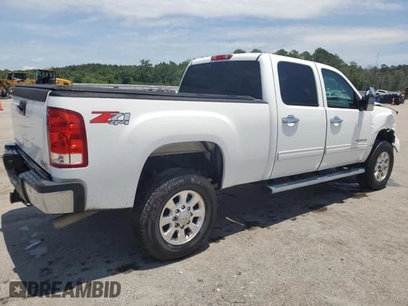 ✅ 2013 GMC Sierra 2500HD SLE • VIN: 1GT120CG6DF182877 • Lot: 60033945. Listed on Copart with 103,279 mi. Free auction sales archive from the USA and detailed vehicle history report at DreamBid. Image 3.