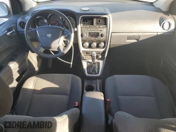 2011 Dodge Caliber Heat with VIN 1B3CB5HA1BD214462, listed as a Copart auction lot 75394274 with 176,495 mi miles and Salvage title. Bid and sale history available at DreamBid. Image 8.