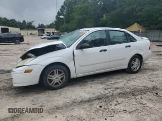 ✅ 2000 Ford Focus • VIN: 1FAHP3434YW213522 • Lot: 65354514. Listed on Copart with 175,341 mi. Free auction sales archive from the USA and detailed vehicle history report at DreamBid. Image 1.