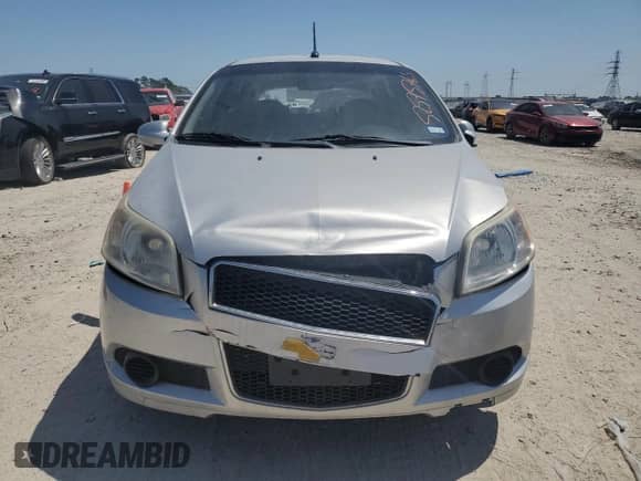 2009 Chevrolet Aveo 1LT with VIN KL1TD66E09B338773, listed as a Copart auction lot 52575765 with 102,617 mi miles and Salvage title. Bid and sale history available at DreamBid. Image 5.