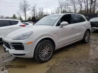 ✅ 2020 Porsche Cayenne E-Hybrid • VIN: WP1AE2AY9LDA22998 • Lot: 38369884. Wystawiony na Copart z przebiegiem 39 779 mil. Bezpłatny archiwum sprzedaży aukcyjnych z USA i szczegółowy raport historii pojazdu na DreamBid. Zdjęcie 1.