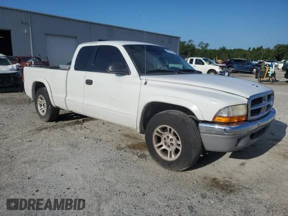 2002 Dodge Dakota SLT с VIN 1B7GL42N72S593692, выставлен на аукционе Copart как лот 69221245 с пробегом 141 599 миль миль и Списание • Salvage title. История ставок и продаж доступна на DreamBid. Изображение 4.