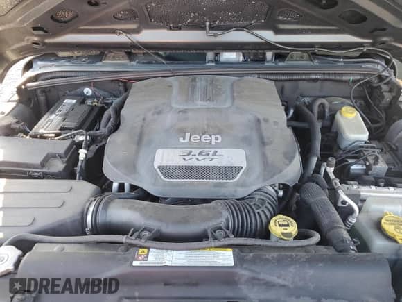 2012 Jeep Wrangler Sport with VIN 1C4AJWAG4CL116725, listed as a Copart auction lot 86132875 with 100,075 mi miles and Salvage title. Bid and sale history available at DreamBid. Image 11.