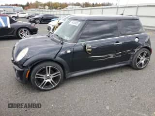 2006 MINI Hardtop S with VIN WMWRE33546TL22436, listed as a Copart auction lot 86408805 with 149,557 mi miles and Salvage title. Bid and sale history available at DreamBid. Image 1.