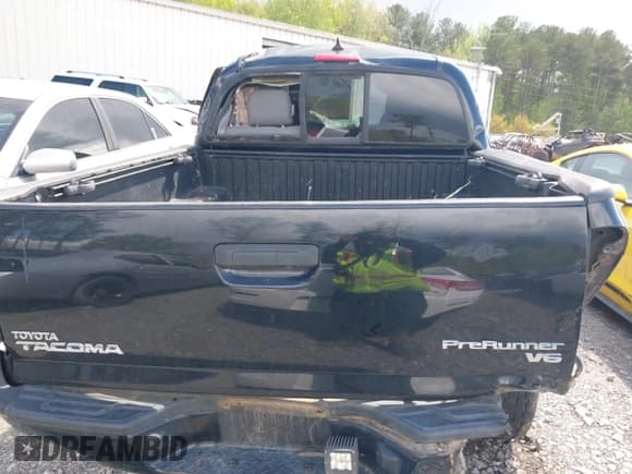 ✅ 2014 Toyota Tacoma PreRunner • VIN: 5TFJU4GN8EX057773 • Lot: 42020511. Listed on IAAI with 228,730 mi. Free auction sales archive from the USA and detailed vehicle history report at DreamBid. Image 15.