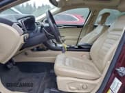 ✅ 2013 Ford Fusion SE Hybrid • VIN: 3FA6P0LU9DR184564 • Lot: 94980745. Listed on Copart with 163,202 mi. Free auction sales archive from the USA and detailed vehicle history report at DreamBid. Image 7.