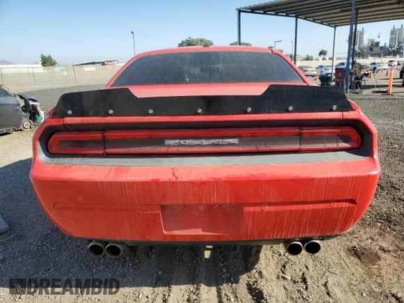 2013 Dodge Challenger R/T Plus z VIN 2C3CDYBT6DH724319, wystawiony jako Copart lot #75309524 z przebiegiem 88 325 mil mil oraz Szkoda całkowita • Salvage title. Historia ofert i sprzedaży dostępna na DreamBid. Obrazek 6.