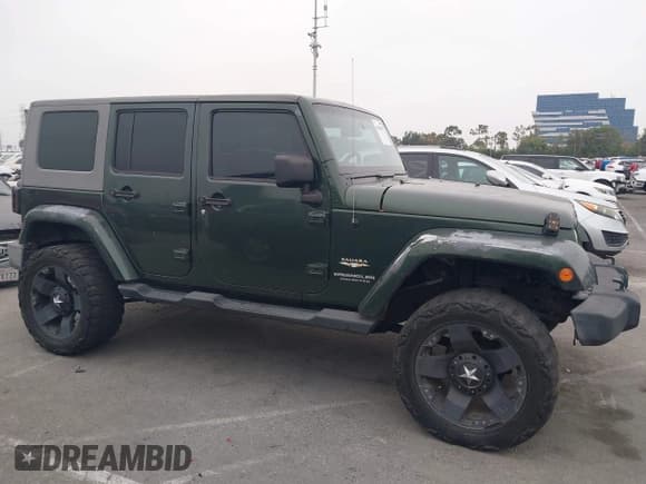 ✅ 2007 Jeep Wrangler Unlimited Sahara • VIN: 1J4GA59147L218594 • Lot: 42984397. Listed on IAAI with 108,296 mi. Free auction sales archive from the USA and detailed vehicle history report at DreamBid. Image 14.
