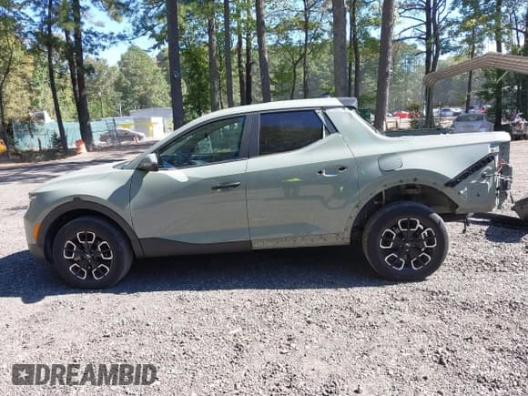 ✅ 2023 Hyundai Santa Cruz SEL • VIN: 5NTJBDAE1PH051702 • Lot: 43368036. Listed on IAAI with 29,225 mi. Free auction sales archive from the USA and detailed vehicle history report at DreamBid. Image 14.