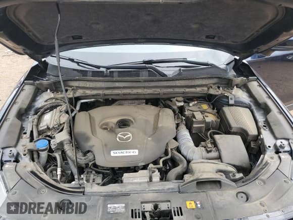 ✅ 2020 Mazda CX-5 Grand Touring Reserve • VIN: JM3KFBAY4L0866965 • Lot: 81674835. Listed on Copart with 41,530 mi. Free auction sales archive from the USA and detailed vehicle history report at DreamBid. Image 12.