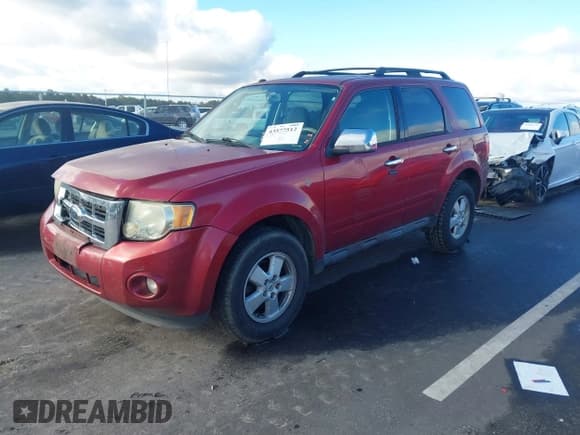 ✅ 2009 Ford Escape XLT • VIN: 1FMCU03789KA07673 • Lot: 43577512. Listed on IAAI with 197,812 mi. Free auction sales archive from the USA and detailed vehicle history report at DreamBid. Image 2.