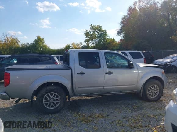 ✅ 2021 Nissan Frontier SV • VIN: 1N6ED0EB0MN718576 • Lot: 43614477. Listed on IAAI with 51,567 mi. Free auction sales archive from the USA and detailed vehicle history report at DreamBid. Image 14.
