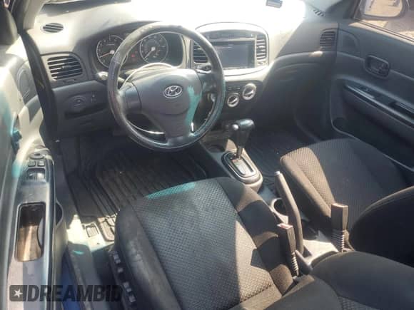 ✅ 2007 Hyundai Accent SE • VIN: KMHCN36C27U004406 • Лот: 69134815. Размещён на Copart с пробегом 172 686 миль миль. Получите бесплатный доступ к архиву аукционных продаж из США и посмотрите подробный отчёт об истории автомобиля на DreamBid. Изображение 8.