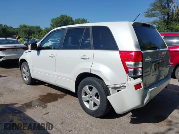✅ 2012 Suzuki Grand Vitara Premium • VIN: JS3TE0D67C4100186 • Lot: 42862856. Listed on IAAI with 133,573 mi. Free auction sales archive from the USA and detailed vehicle history report at DreamBid. Image 3.