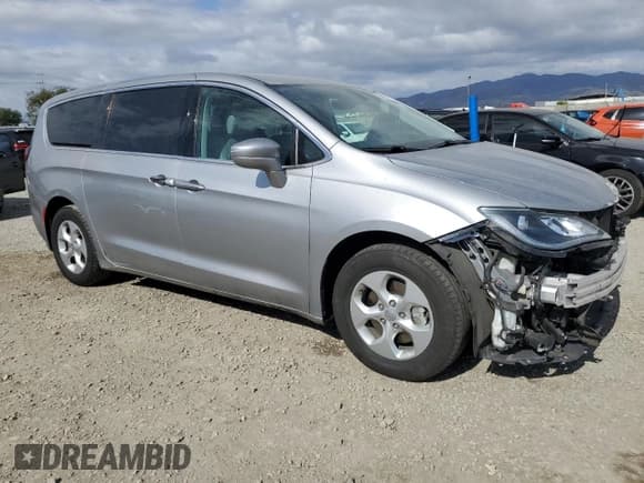 ✅ 2018 Chrysler Pacifica Hybrid Touring Plus • VIN: 2C4RC1H76JR126912 • Lot: 54364745. Listed on Copart with 132,172 mi. Free auction sales archive from the USA and detailed vehicle history report at DreamBid. Image 4.
