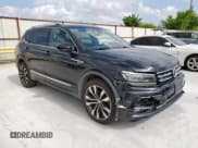 ✅ 2018 Volkswagen Tiguan SEL Premium • VIN: 3VV5B7AX0JM198048 • Лот: 59508685. Опубликован ранее на Copart с пробегом 88 052 миль. Бесплатный доступ к архиву аукционных продаж из США и подробный отчёт об истории автомобиля на DreamBid. Изображение 4.