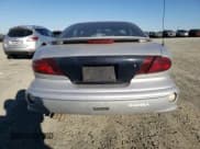 ✅ 2002 Pontiac Sunfire SE • VIN: 1G2JB124727244103 • Lot: 89210465. Wystawiony na Copart z przebiegiem 215 701 mil. Bezpłatny archiwum sprzedaży aukcyjnych z USA i szczegółowy raport historii pojazdu na DreamBid. Zdjęcie 6.